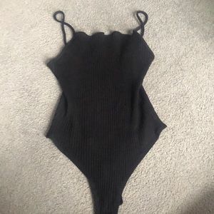 Women’s Cale ribbed tank leo size M.